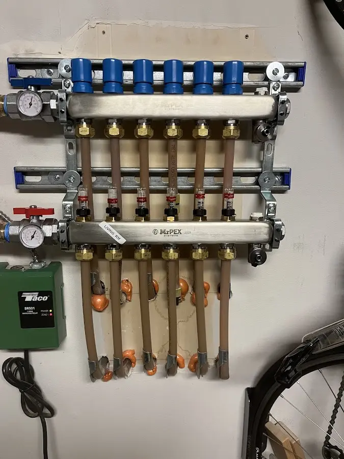 Plumber performing Gas Leak Detection at a residential property in Sabattus